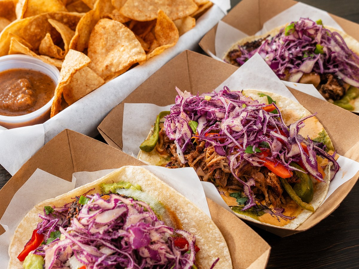 Taco Tuesday group order with tacos and chips in Austin, TX