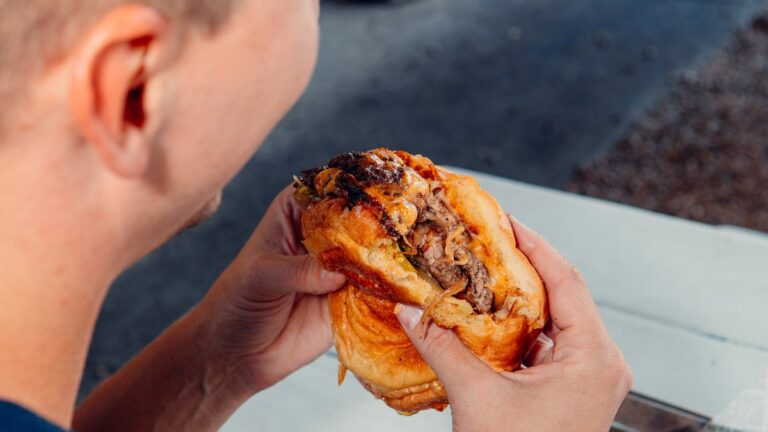 Torta in hand at Austin Daily Press patio in East Austin, Austin, TX
