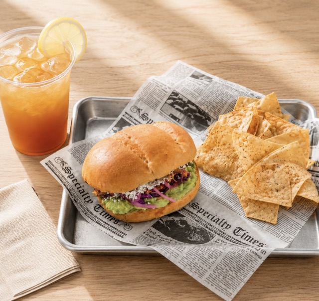 Chicken tinga torta combo with chips and iced tea at Austin Daily Press in East Austin